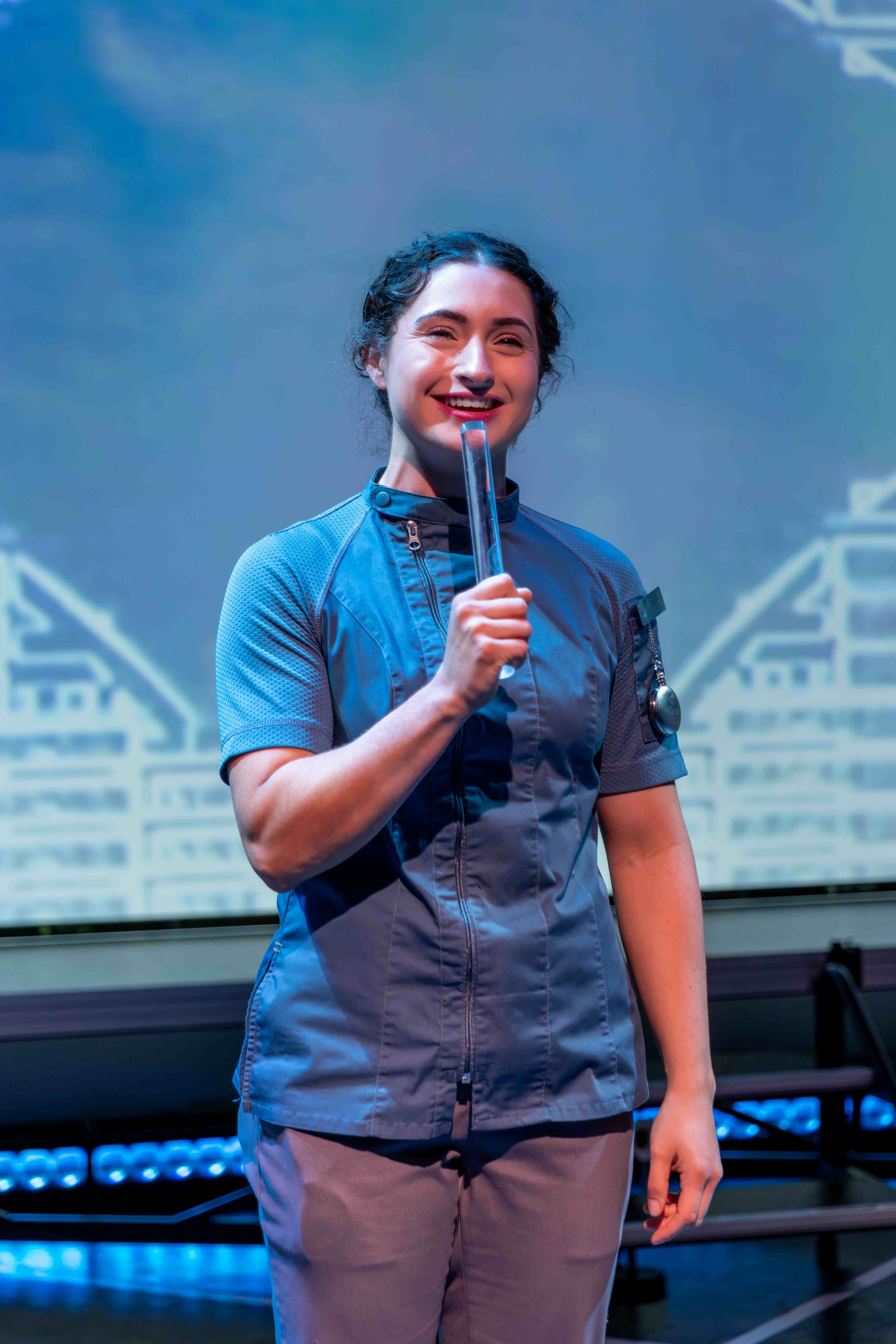  Rachel Fink as MEDIA. 