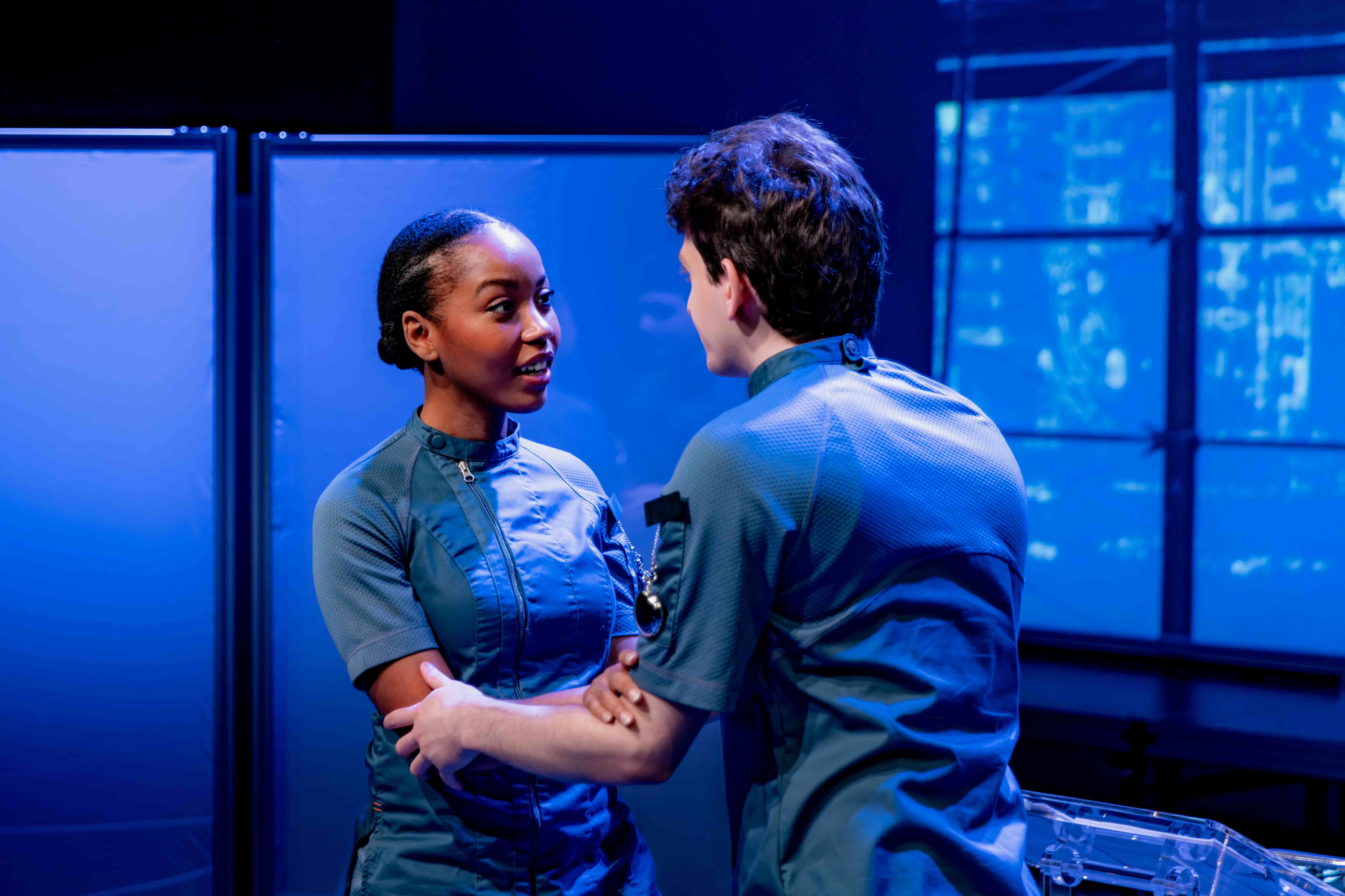  Cassandra Umaña as O-90 and Aaron Greenberg as D-503. 